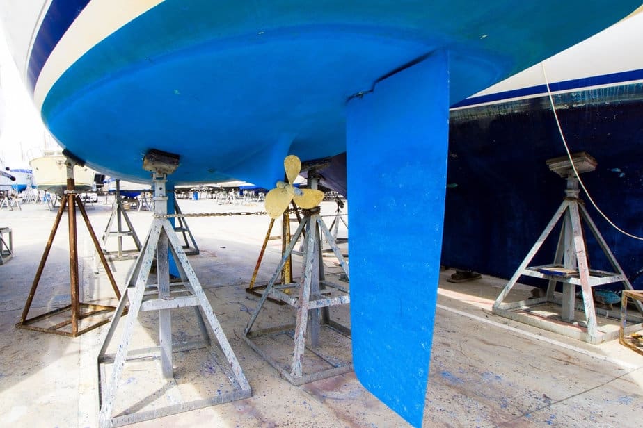 Boat keel freshly painted and repaired while boat is o dry land